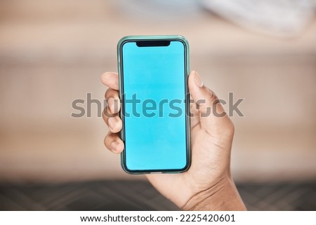 Green screen, phone and mockup in hand of man showing marketing logo, contact us or brand on smartphone with ux UI advertising design. Blue screen 5g smartphone for communication and networking space