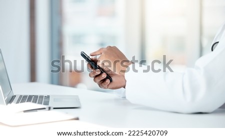 doctor, laptop and hands with phone for online communication in hospital office. Man, healthcare innovation and medical science doctor or cardiology research on internet tech mobile smartphone