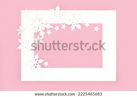 Snowflake and star decorative abstract festive Christmas pink background. Minimal design for winter, Xmas and New Year holiday season.  