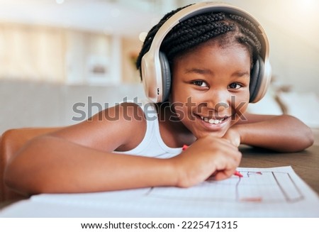 Online education, headphones and african girl in portrait writing, drawing and learning at home in virtual class happy with her language audio assessment. Black student child in elearning video call