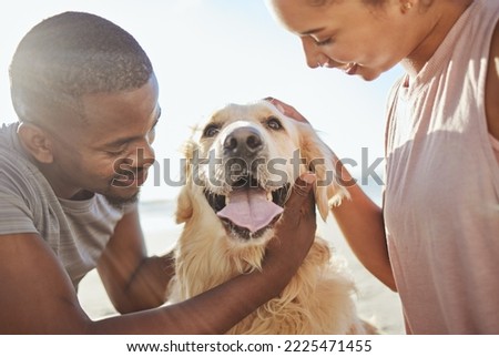 Couple, dog and love, together at beach for fun trip, happy and pets animal with care. Bonding, spending quality time and black man with woman by the ocean on adventure with golden retriever puppy. Royalty-Free Stock Photo #2225471455
