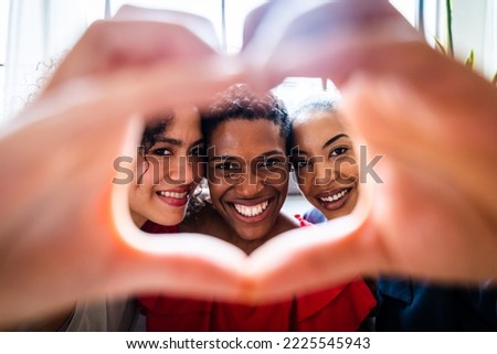 Happy beautiful hispanic south american and black women meeting indoors and having fun - Black adult females best friends spending time together, concepts about domestic life, leisure, friendship Royalty-Free Stock Photo #2225545943