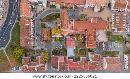 Old European Quarter from above. European houses filmed from a drone. Old city quarter. Red brick roofs. Cozy European courtyard. Belarus in autumn, October.