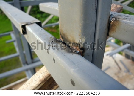 Welding of galvanized steel roof structures. Perform a spot weld in line with the temporary joint. . 