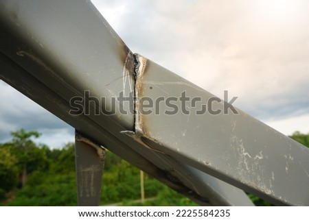 Welding of galvanized steel roof structures. Perform a spot weld in line with the temporary joint. . 
