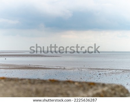 Pastel coloured beach view over low tide at Shoeburyness