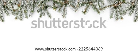Snowy Merry Christmas garland made of fir branches on white background. Happy New Year and Xmas, top view, wide banner