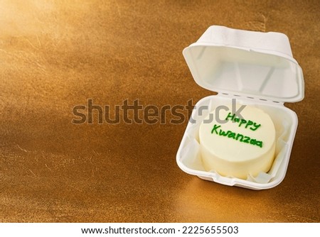 Happy Kwanzaa bento cake in takeout box