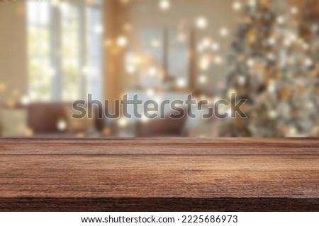 Wooden table with Christmas or new year background Royalty-Free Stock Photo #2225686973