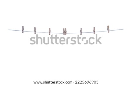 Eight wood cloth clip hanging on rope isolated on white background	,clipping path