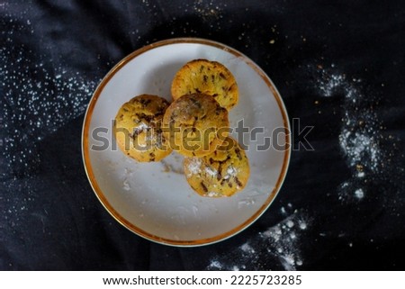 Sponge cake served on aesthetic pedestal.Nutritive snack, dessert or breakfast.Background.Food close-up.