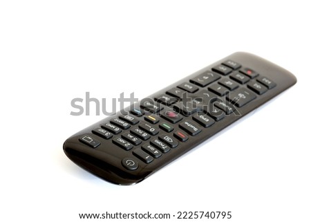 Black remote control for TV on white background