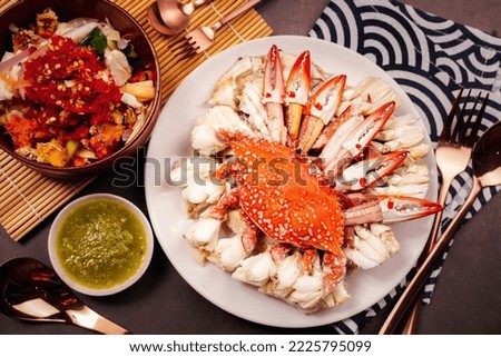 Top view Preparation for homemade crab in a old metal pot ,Dishes on plates with delicious dipping sauces Royalty-Free Stock Photo #2225795099