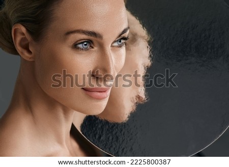 Beauty portrait of woman with perfect and shiny skin. Concept of skin care and aesthetic cosmetology, high quality Royalty-Free Stock Photo #2225800387