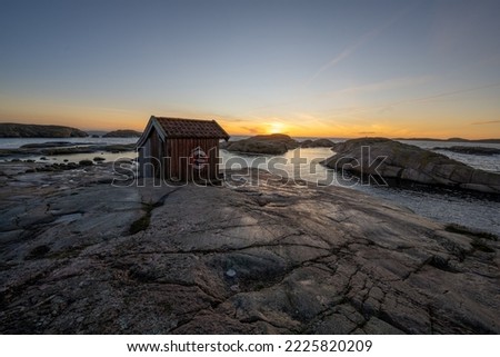Boat shed on the Swedish west coast at sunset