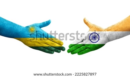 Handshake between India and Rwanda flags painted on hands, isolated transparent image.