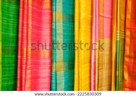 Handmade Indian silk sari, saree with golden details, woman wear on festival, ceremony and weddings, expensive sarees are famous for their gold and silver zari, brocade. Incredible India. Royalty-Free Stock Photo #2225830309