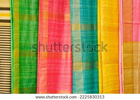 Handmade Indian silk sari, saree with golden details, woman wear on festival, ceremony and weddings, expensive sarees are famous for their gold and silver zari, brocade. Incredible India. Royalty-Free Stock Photo #2225830313