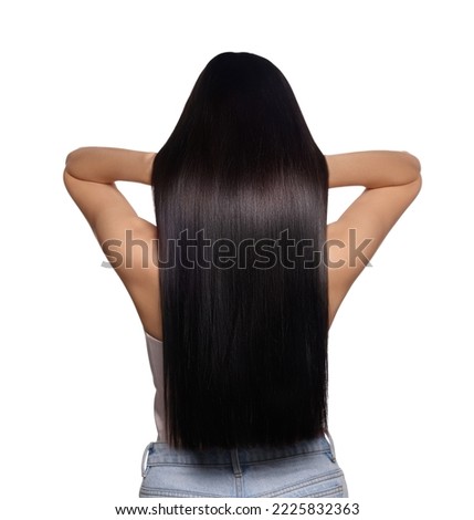 Woman with strong healthy hair on white background, back view Royalty-Free Stock Photo #2225832363