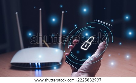 Selective focus at people hand while using smartphone to type password credential to login to Internet wireless connection at home. Network security of internet access into router with futuristic icon