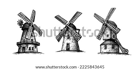 Old windmills. Tower mills and post mill. Hand drawn ink sketch. Royalty-Free Stock Photo #2225843645