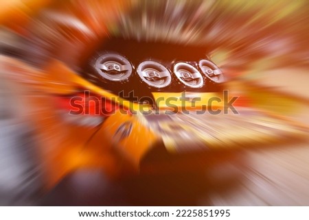 Sport car in motion with big sub-woofers on the back. Royalty-Free Stock Photo #2225851995
