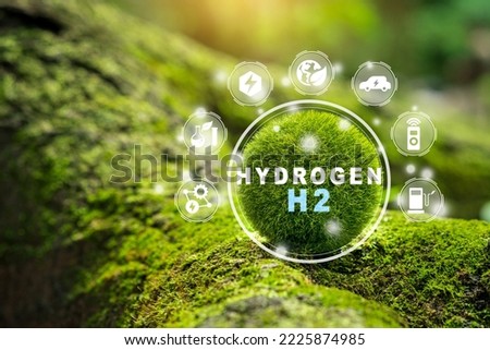 Close up earth on nature background with icon H2 Fuel Modern Manufacturing. Hydrogen green clean ecological energy. Hydrogen Industry Concept.  Royalty-Free Stock Photo #2225874985