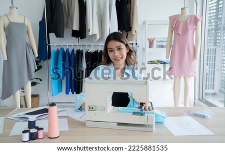 asian female designer working at studio