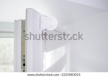 Window roller duo system day and night. Close up on roll curtains indoor Royalty-Free Stock Photo #2225883021