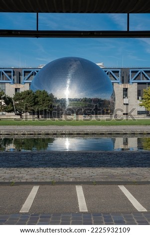 Villette Canal. View of La Geode and building of the Science and Industry museum Royalty-Free Stock Photo #2225932109