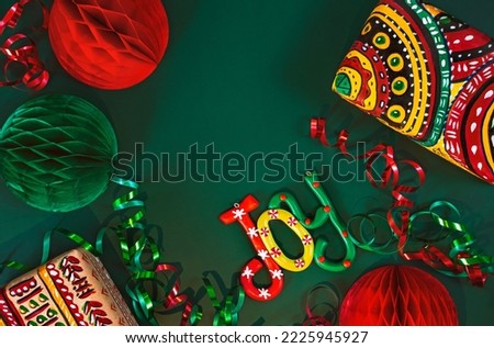 Happy Kwanzaa background with gifts in boxes wrapped in hand-painted paper