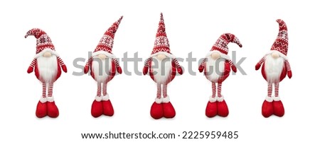 Five Christmas  gnome standing isolated on white background.
