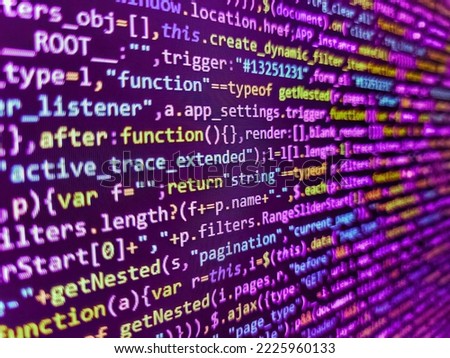 Lines of Html code visible. Lots of digits on the computer screen. Script procedure creating. Javascript code in bracket software. Shallow depth of field, selective focus effect