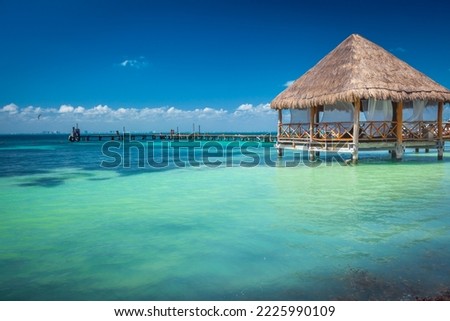 Cancun idyllic caribbean beach and gazebo Palapa, Riviera Maya, Mexico Royalty-Free Stock Photo #2225990109