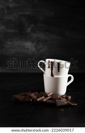 High angle pieces chocolate pile mugs 