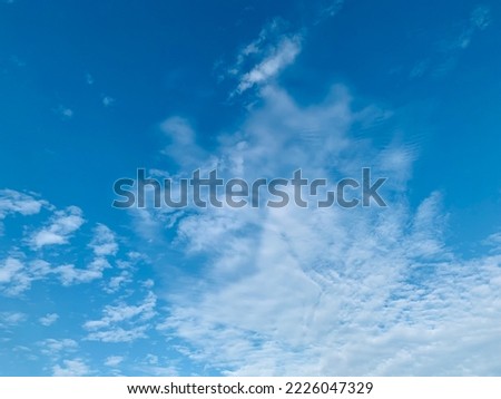 Altocumulus clouds are filled with beautiful eagle-like streaks at Thailand in the morning.no focus