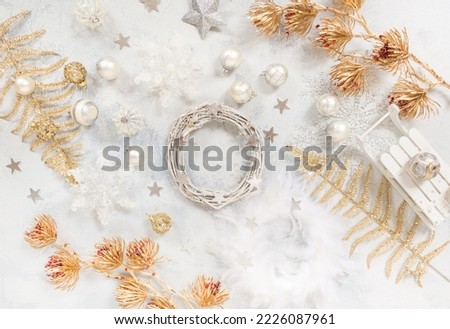 Christmas  background with ornaments, balls and, top view  in white and golden tone