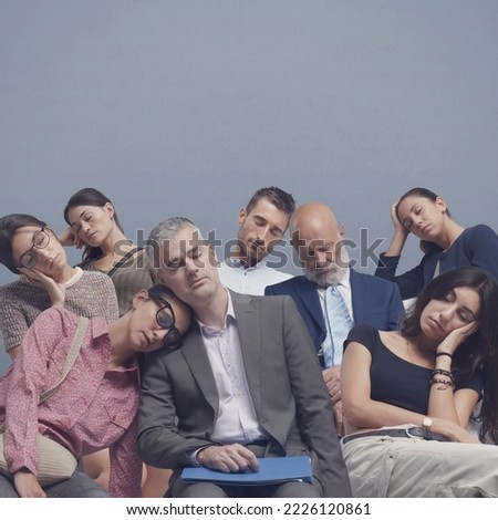 Group of diverse tired people sitting on chairs and falling asleep after waiting for hours, bored audience and long wait concept, blank copy space