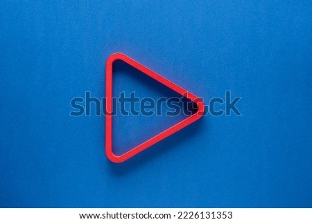 Triangle play button vector icon. Triangle background.
 Play and arrow sign logo elements