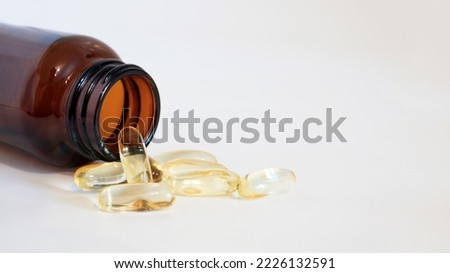 Omega 3 softgels. Fish oil capsules. Source of omega-3 polyunsaturated fatty acids. Banner. Copy space