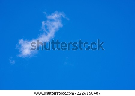 blue beautiful sky with various light airy white clouds