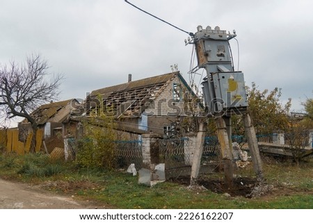 War in Ukraine. 2022 Russian invasion of Ukraine. Countryside. An electrical transformer damaged by shelling. Destruction of infrastructure. Terror of the civilian population. War crimes Royalty-Free Stock Photo #2226162207
