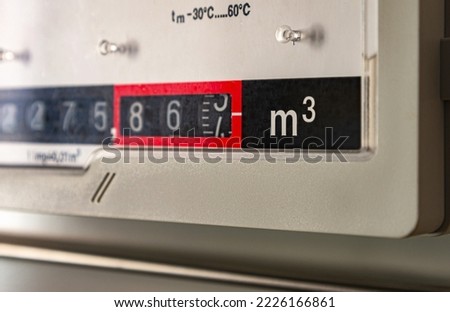 Home gas meter, close-up, selective focus. Cubic meter - unit of gas consumption at home.   Royalty-Free Stock Photo #2226166861