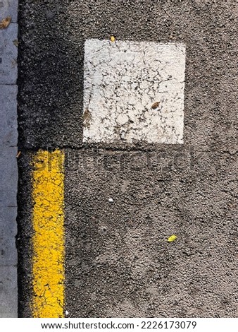 Traffic lines painted on the asphalt of a street in Barcelona