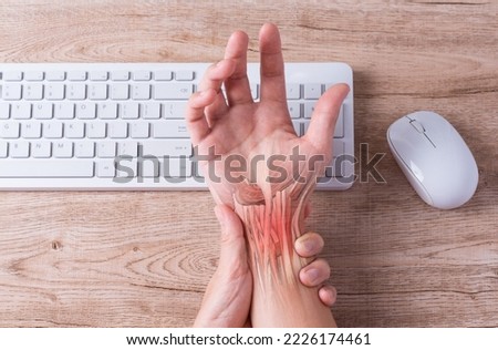 hand muscle inflammation from office syndrome , hand muscle pain from working Royalty-Free Stock Photo #2226174461
