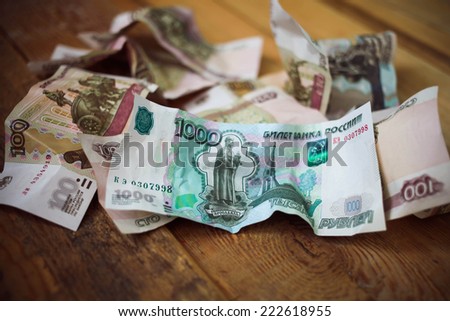 Crumpled scattered Russian rubles