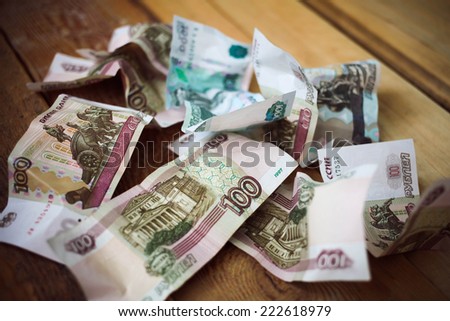 Crumpled scattered Russian rubles 