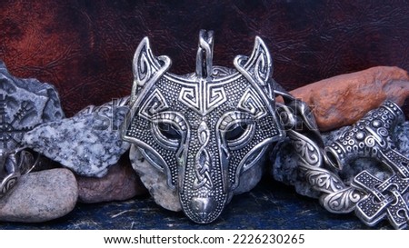 Vikings amulet wolf head silver vintage mystic abstraction Royalty-Free Stock Photo #2226230265