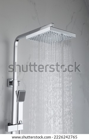 Luxury shower in modern bathroom. Square shower head with a perfect water flowing to enjoy your relax moments Royalty-Free Stock Photo #2226242765