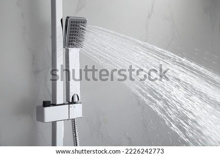 luxury chromed shower in modern marble bathroom Royalty-Free Stock Photo #2226242773